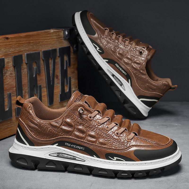 Herrenschuhe aus Leder mit Kroko-Prägung.