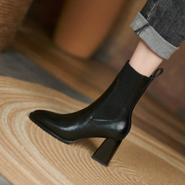 High-heeled boots with a square toe