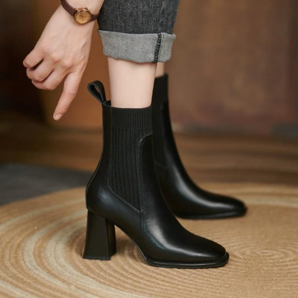 High-heeled boots with a square toe