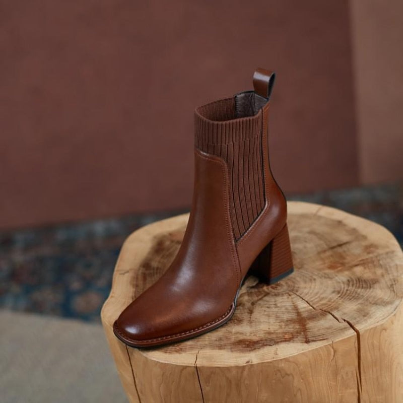 High-heeled boots with a square toe