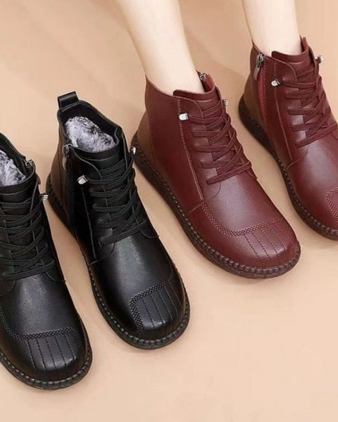 Botas de cuero femenino (rayas en la punta del zapato) 